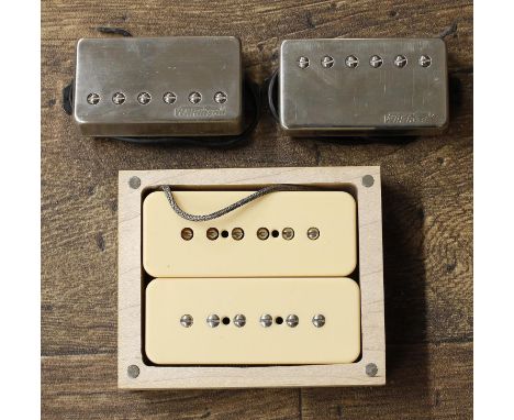 Pair of Homeland P90 guitar pickups; together with a pair of Wilkinson humbucker guitar pickups 