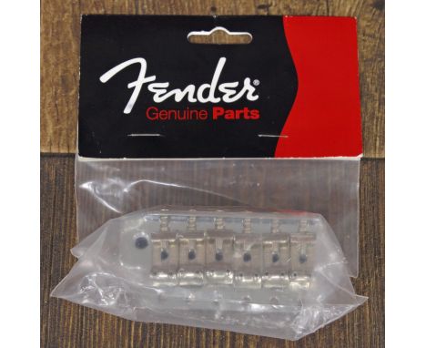 Fender Genuine Parts vintage Stratocaster guitar bridge assembly, including block, plate and saddles 