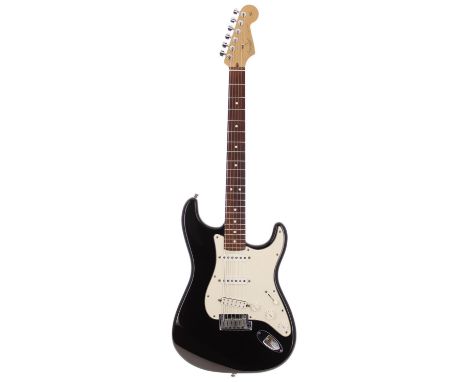 2000 Fender American Standard Stratocaster electric guitar, made in USA; Body: black finish, buckle scratches to back, scuffs