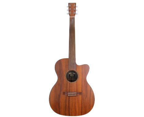 2008 C.F Martin OMCXK2E acoustic guitar, made in Mexico; Body: HPL koa; Neck: good, ply; Fingerboard: professional metal plat