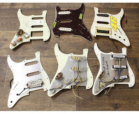 Five Strat scratchplates, some fitted with an assortment of electronics including a set of Tone Rider Pure Vintage single coi