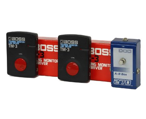 Two Boss TM-3 Training Monitor/Line Driver units, boxed; together with a DOD 270 A-B Box (3)  *Please note: Gardiner Houlgate