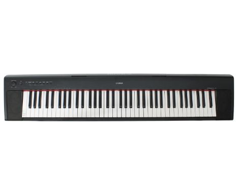 Yamaha Piaggero NP-31 electric piano, with Stagg stand  *Please note: Gardiner Houlgate do not guarantee the full working ord