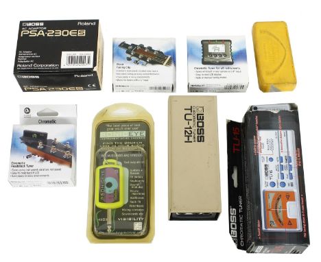 Selection of tuner devices to include a Boss TU-12H in original case, a Boss TU-15, boxed, three Planet Waves chromatic heads