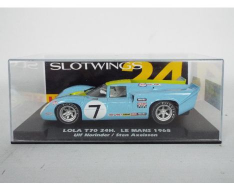 Slotwings - a 1:32 scale racing slot car. Item is a Lola T70 24h Le Mans 1968 &amp; is coded with W004-02. Item appears to be