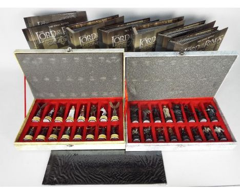 Eaglemoss - Lord Of The Rings - A cased LOTR chess set with board and 7 x binders with a quantity of the accompanying magazin
