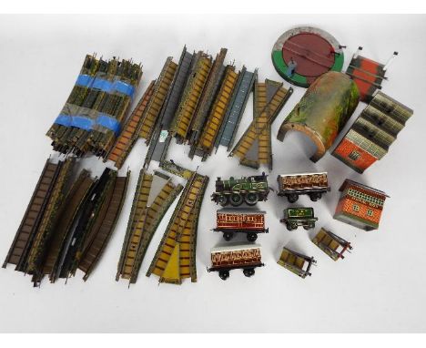 Bing - An unboxed OO gauge Clockwork 2-4-0 steam locomotive and tender (with a key) Op.No.504 in green LNER livery, with thre