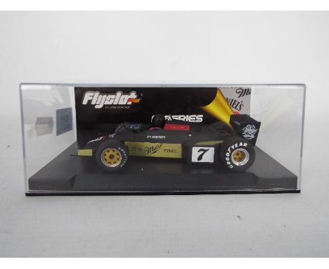 Flyslot - A 1:32 scale racing slot car. Item is a Williams FW08C Miller edition &amp; carries the code 040302. Item appears m