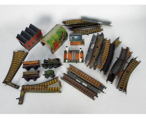 Bing - An unboxed OO gauge Clockwork 2-4-0 steam locomotive and tender (with a key) Op.No.504 in green LNER livery, with two 