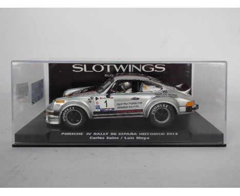 Slotwings - A 1:32 scale slot racing car. Item is a porsche IV rally de Espana historico from 2012 with reference number W044