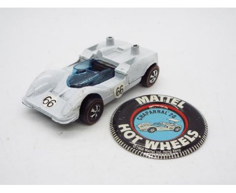 Hot Wheels - Redlines - A 1968 dated Hong Kong made Chaparral 2 G in hard to find White Enamel finish with it's original Coll