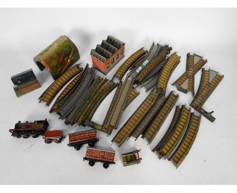 Bing - A box of loose Miniature 1920s 00 gauge Table Railway items. Contains a clockwork 2-4-0 loco with key, 2 x coaches, 28