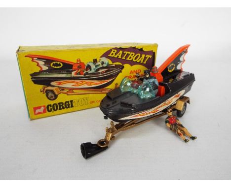 Corgi Toys - A boxed 1st issue Corgi Toys #107 Batboat and Trailer. The Batboat in black   1st issue tin tail fin and tin lit