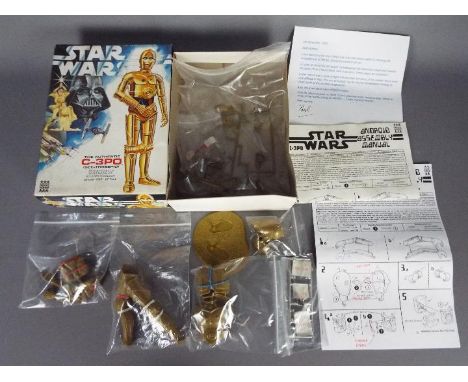 Star Wars, Denys Fisher - A boxed vintage Denys Fisher Star Wars C-3PO 10" tall plastic model kit. The model kit appears to b