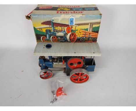Wilesco - A boxed Wilesco Old Smokey Steam Traction Engine. The model appears in Good condition overall with some signs of ag