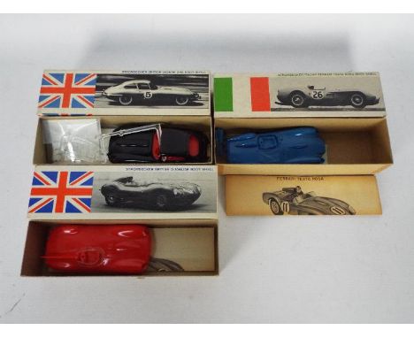 Strombecker - Three vintage 1:32 scale car kits comprising Ferrari Testa Rossa Bodt Shell,  D-Jaguar Body Shell and Jaguar XK