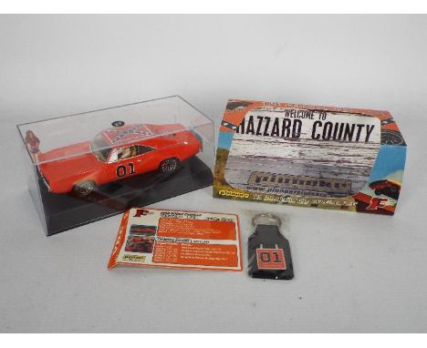 Pioneer - a 1:32 scale 69' General Lee Dodge charger racing car from the hit TV series the Dukes of Hazzard. Box appears to b