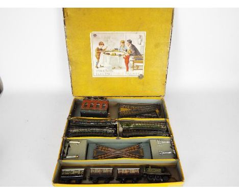 Bing - A Miniature 1920s 00 gauge Electric Table Railway set number # 2. Contains a 2-4-0 Great Western loco, 2 x coaches, a 