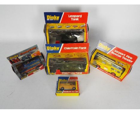 Dinky Toys - Five boxed diecast vehicles by Dinky Toys. Lot includes #263 Airport Fire Rescue Tender (red wheel hubs); #390 C