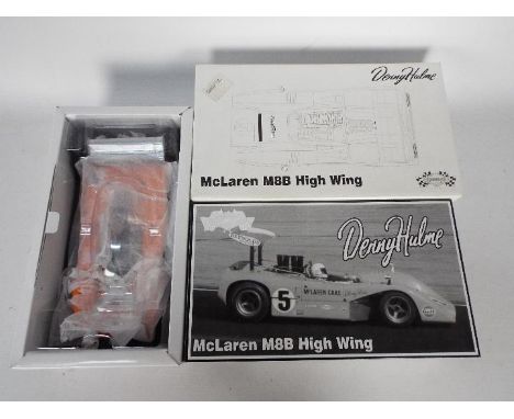 GMP - A boxed 1:18 scale Denny Hughes McLaren M8B High Wing # 12027, model appears M in NM original box and outer card box. (