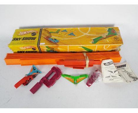Hot Wheels - Redlines - A 1969 dated Sky Show Daring Stunt Flyers set with a red Custom Fleetside truck, 2 x planes, 13 x tra