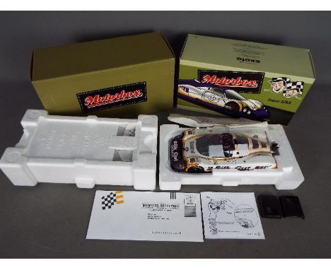 Exoto - Motorbox - Jaguar XJR9LM Le Mans racing car # MTB00104. This car has a removable rear body section and an unfitted re
