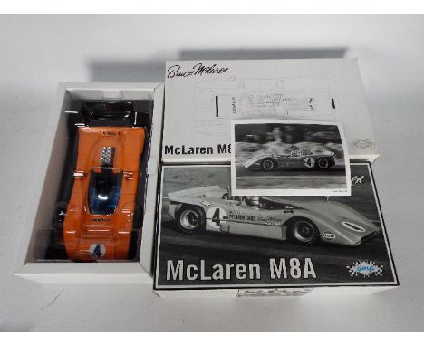 GMP - A boxed 1:18 scale Bruce McLaren M8A McLaren # 12021, model appears M in NM original box and outer card box. (This does