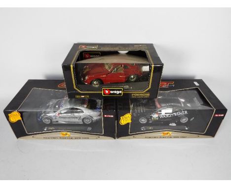 Three 1:18 scale models comprising two Maisto GT Racing series Mercedes-Benz CLK-DTM (2000 and 2002) and a Bburago Porsche 35