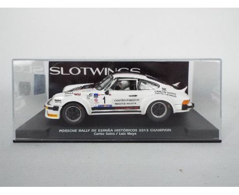 Slotwings - A 1:32 scale racing slot car. Item is a Porsche Rally de Espana Historicos 2013 champion &amp; is coded with W044