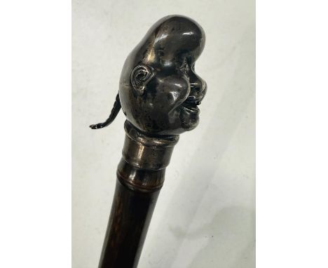 A 19th Century bamboo cane stick with silver articulated Chinaman's head as perfume atomiser, London, 1886, 91cm.