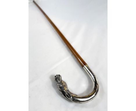 An Edwardian cane riding stick with silver loop handle having horse's head finial and engraved 'Arthur MacArthur', London, 19