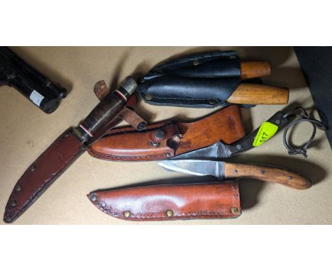 An 'Old Timer' leather sheathed knife, two Norwegian knives and two others.