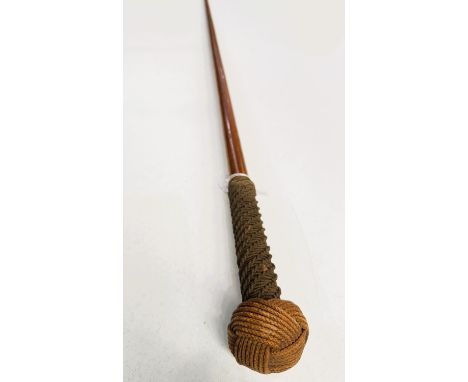 A vintage hardwood stick with ropework band and knotwork finial, 90cm.
