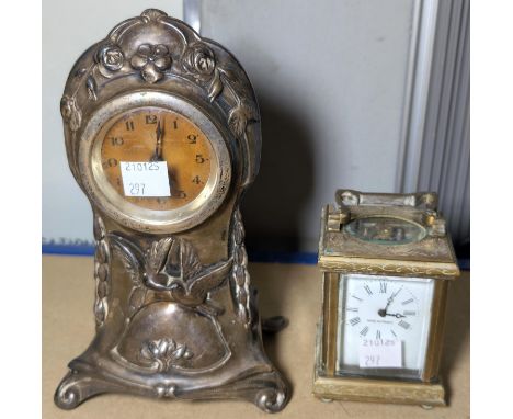 A small 19th century style brass carriage clock with ornately chased case, with time piece movement, height 9cm; an ornate si