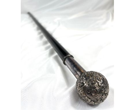 A 19th Century ebonised ceremonial stick with embossed white metal ball and shaft finial, 93cm.