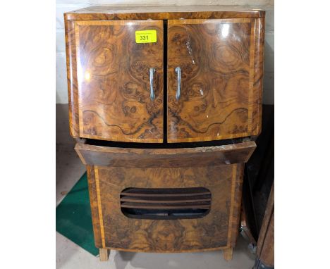 An early/mid 20th century highly polished figured walnut console or cabinet for pre war radio or TV (base incomplete) ; a pai
