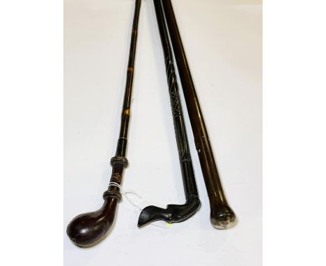 A vintage walking stick with horn knop, 86cm, and two others (3).