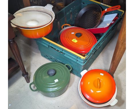 A selection of vintage Le Creuset and other similar cookware.