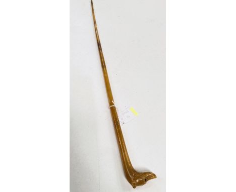 An unusual 19th Century carved horn swagger stick with dog's head finial, 63cm.
