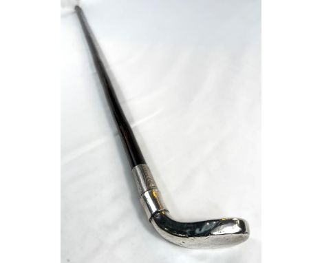 A late Victorian walking cane with silver 'Sunday Stick' golf finial, Birmingham, 1895, 92cm.