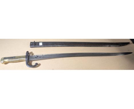 A French 19th century model 1866 Chassepot bayonet and scabbard, stamped blade.