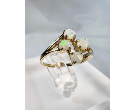 An antique 9 carat gold opal set dress ring in box.