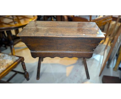 An 18th century country oak bread kneading trough with lid, on four legs.Condition report: Reasonable condition for its age. 