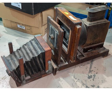 A Victorian magic lantern slide projector with enlarger, lenses etc.