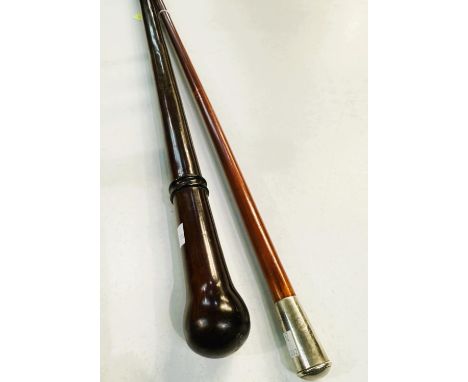 An early 20th Century turned hardwood parade ground stick, 89cms, and another with boy scout finial (2).
