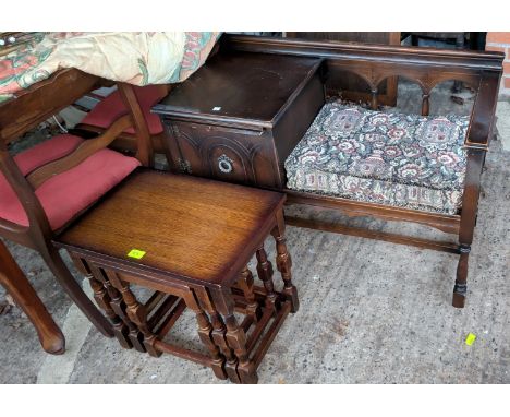 An oak nest of three occasional tables and an oak hall table; a standard lamp and a card table.