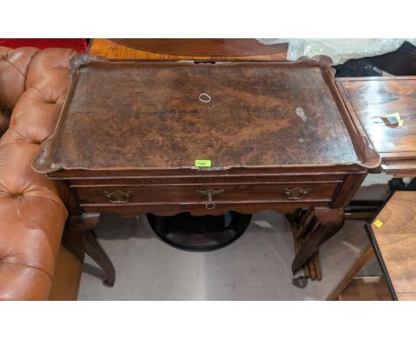 A 19th century occasional table with burr walnut basin top with raised scalloped edges, four cabriole legs, single drawer.