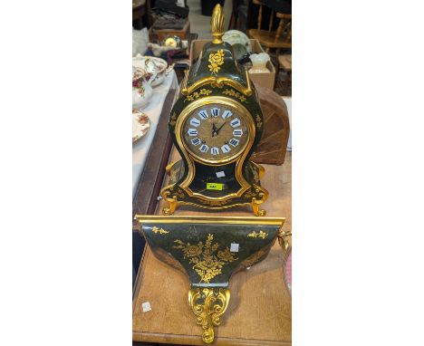 A Zenith reproduction bracket clock in green and gilt with well step.