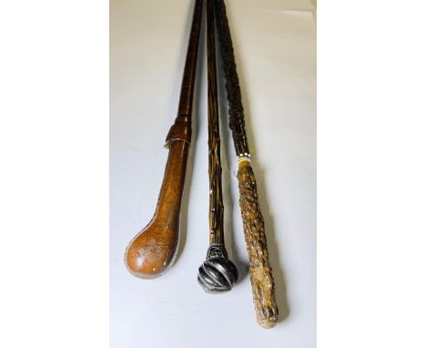 A vintage stitched leather stick, 82cm, and two other unusual sticks (3).