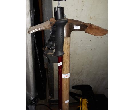A Trespass Transcender walking pole and an ice axe 